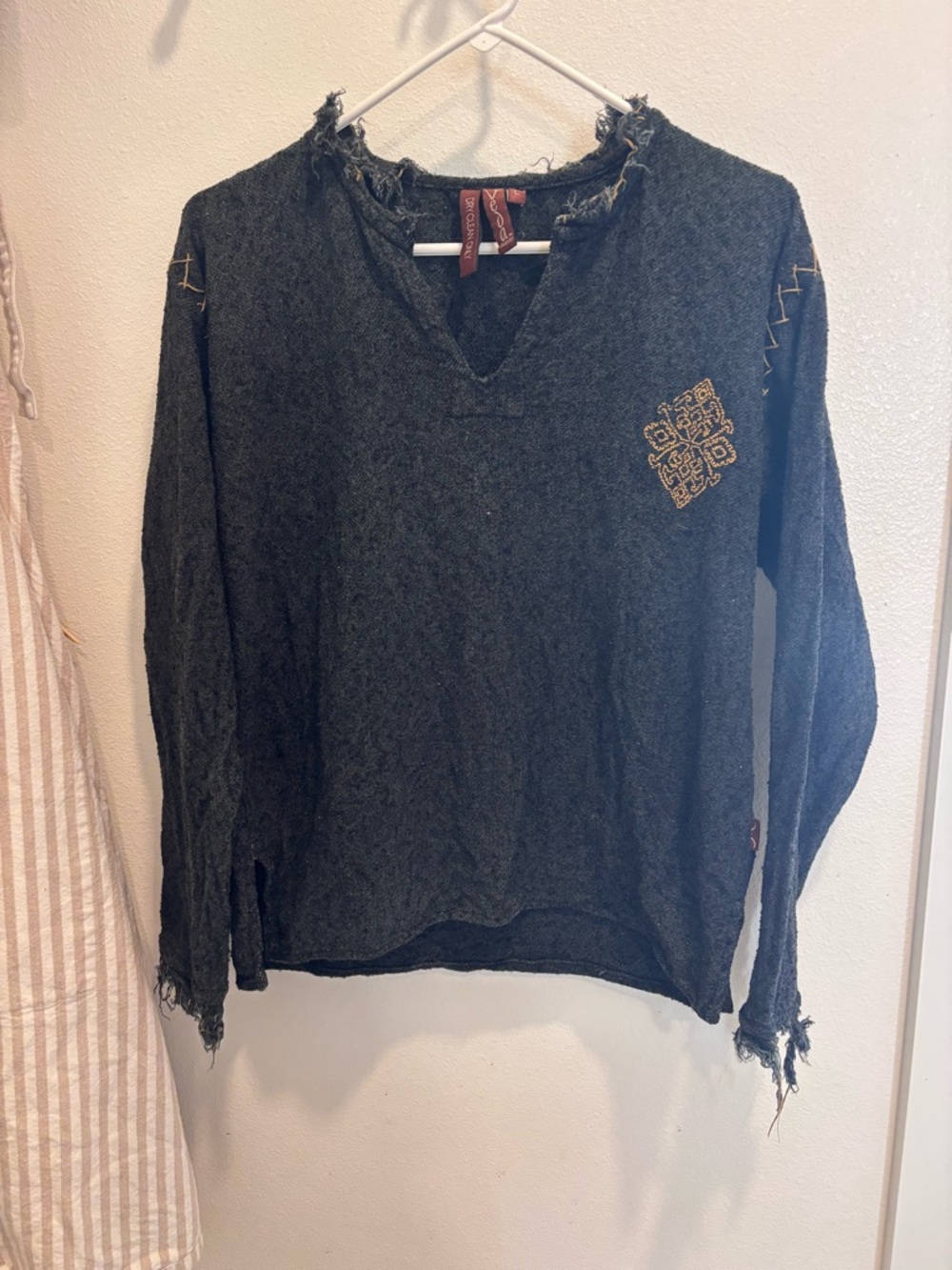 This is Veda gray embroidered distressed pullover. Very unique
